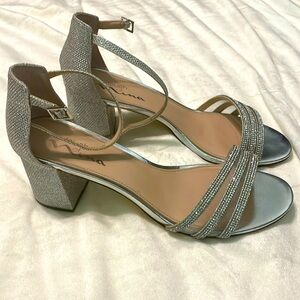 Authentic Touch of Nina silver heels